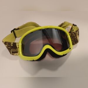 Smith Optics snow or ski goggles in a neon yellow frame with a patterned strap
